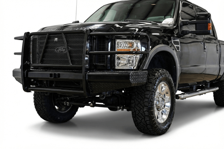 TrailFX FX3001A full replacement front bumper with integrated grille guard for 2008-2010 Ford F250 and F350 Super Duty, featuring a textured black powder-coat finish.