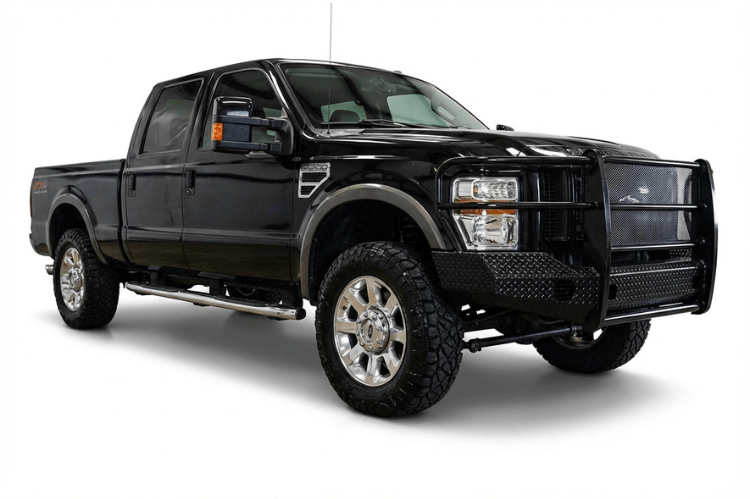 TrailFX FX3001A full replacement front bumper with integrated grille guard for 2008-2010 Ford F250 and F350 Super Duty, featuring a textured black powder-coat finish.
