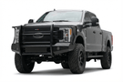TrailFX FX3023 full replacement front bumper for 2017-2022 Ford F250 and F350 Super Duty trucks, featuring a heavy-duty grille guard and black powder-coated finish.