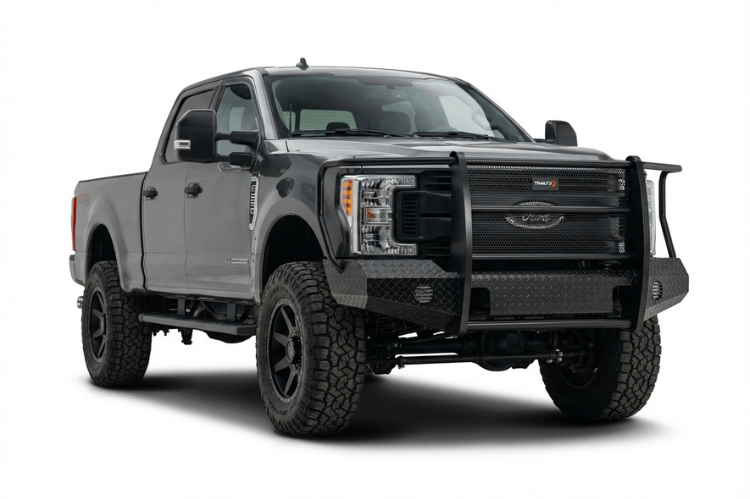TrailFX FX3023 full replacement front bumper for 2017-2022 Ford F250 and F350 Super Duty trucks, featuring a heavy-duty grille guard and black powder-coated finish.