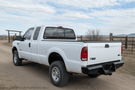 2004 Ford F250 Superduty equipped with Workhorse Kit featuring Ranch Hand front and rear bumpers for heavy-duty protection and rugged performance