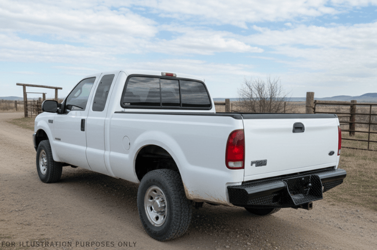 2004 Ford F250 Superduty equipped with Workhorse Kit featuring Ranch Hand front and rear bumpers for heavy-duty protection and rugged performance