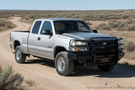 2007 Chevy Silverado 2500 equipped with the Workhorse Kit featuring Ranch Hand Legend front and rear bumpers designed for rugged performance and full-coverage protection.