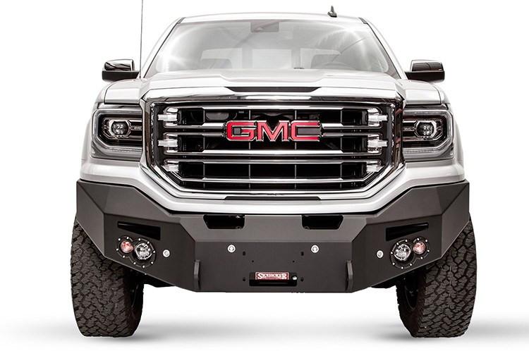 Front of a white GMC truck displaying the Fab Fours GC15-H3451-1 premium black bumper, compatible with 2015-2020 GMC Canyon
