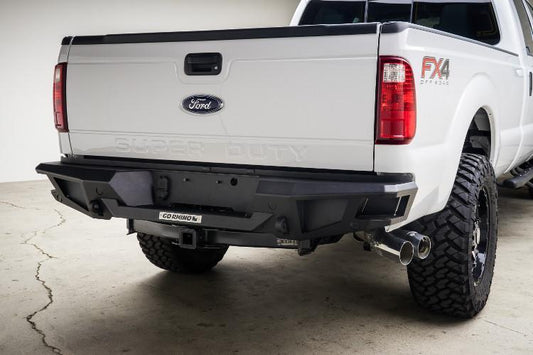 Go Rhino 28373T BR20 rear bumper for Ford Super Duty 2017–2022 – heavy-duty steel construction, textured black finish, corner steps, LED light mounts, aftermarket truck bumper upgrade