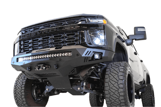 Black truck front end showcasing ADD F271202890103 Stealth Fighter bumper, designed for Chevy Silverado 2500/3500, winch-ready with sensors