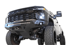 Black truck front end showcasing ADD F271202890103 Stealth Fighter bumper, designed for Chevy Silverado 2500/3500 2020-2023, winch-ready with sensors