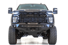 Black truck front end showcasing ADD F271202890103 Stealth Fighter bumper, designed for Chevy Silverado 2500/3500 2020-2023, winch-ready with sensors