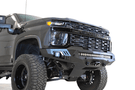 Black truck front end showcasing ADD F271202890103 Stealth Fighter bumper, designed for Chevy Silverado 2500/3500 2020-2023, winch-ready with sensors