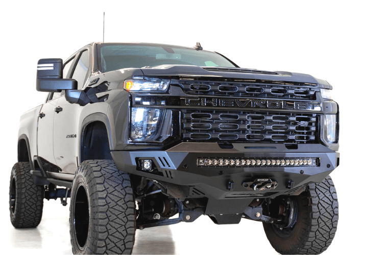 Black truck front end showcasing ADD F271202890103 Stealth Fighter bumper, designed for Chevy Silverado 2500/3500 2020-2023, winch-ready with sensors