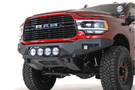 Front view of a red Ram truck featuring the ADD F560014110103 Bomber Black front bumper for Dodge Ram 2500/3500 models