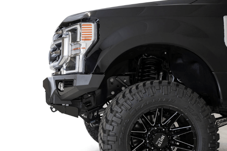 Black Ford truck's front end showcasing an ADD Bomber Black bumper F160014100103, tailored for 2017-2022 F250/F350 Superduty vehicles
