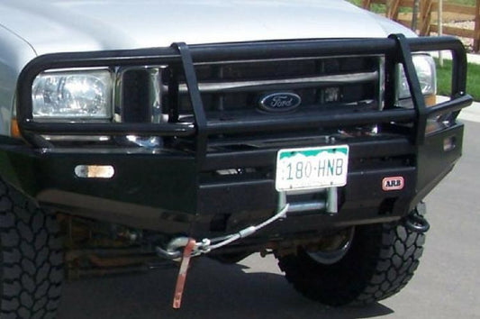 Ford Superduty truck  showcasing  ARB deluxe durable black powder-coated front bumper with grille guard.