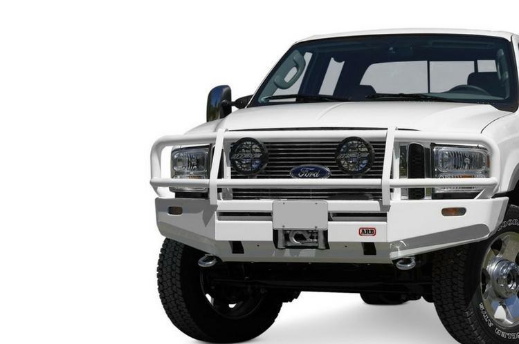 Ford Superduty truck  showcasing  ARB deluxe durable black powder-coated front bumper with grille guard.
