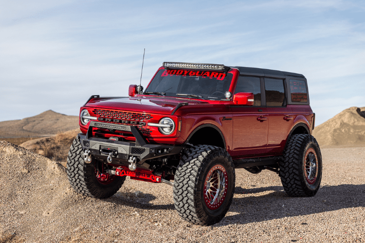 Bodyguard LBF21MYTNN Baja winch-ready heavy duty off road front bumper with push bar design in textured black for 2021–2026 Ford Bronco—sensor-compatible truck bumper built for rugged performance by Bodyguard Bumpers