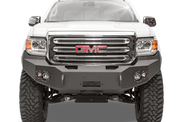 Front of a white GMC truck displaying the Fab Fours GC15-H3451-1 premium black bumper, compatible with 2015-2020 GMC Canyon