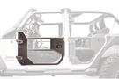 Open doors of a Jeep Wrangler JL 2018-2024, showcasing the Fab Fours JL1032-1 Half Front Tube Door design