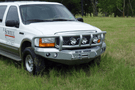 Road Armor Stealth 60502B 2005-2007 Ford F250/F350 Superduty Front Winch Ready Bumper Titan II Grille Guard, Black Finish and Round Fog Light Hole