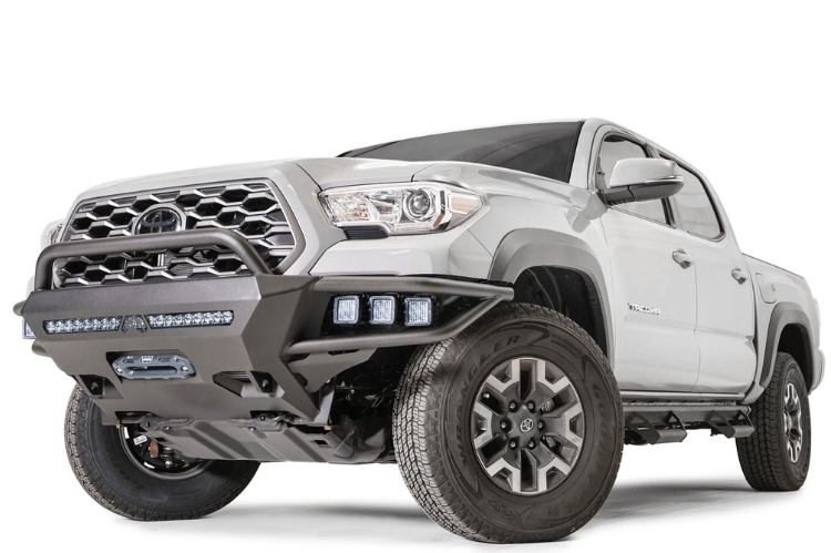The Fab Fours TB16-02-1 Ultra Light Hybrid Front Bumper for 2016-2023 Toyota Tacoma is winch ready and features a pre-runner guard