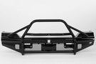 A black Ford Super Duty truck with a Ranch Hand Legend BullNose Series front bumper showcasing its robust design.