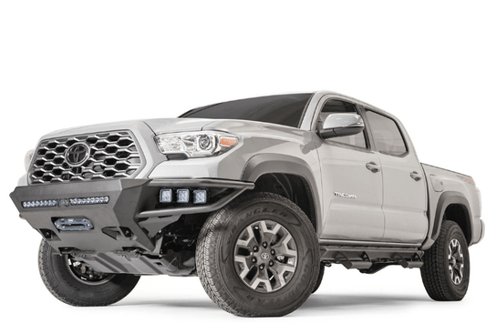 Fab Fours front winch bumper TB16-01-1 for 2016–2023 Toyota Tacoma, off-road front bumper replacement with winch-ready design.