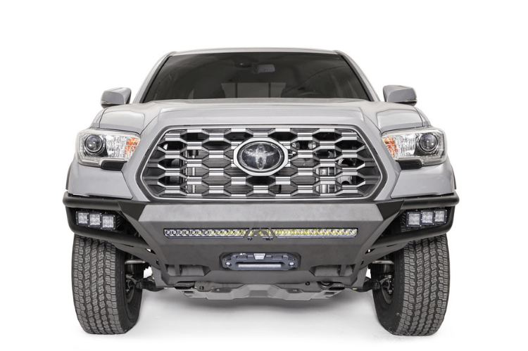 Fab Fours front winch bumper TB16-01-1 for 2016–2023 Toyota Tacoma, off-road front bumper replacement with winch-ready design.