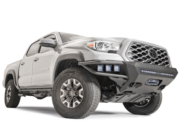 Fab Fours front winch bumper TB16-01-1 for 2016–2023 Toyota Tacoma, off-road front bumper replacement with winch-ready design.