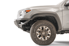 Fab Fours front winch bumper TB16-01-1 for 2016–2023 Toyota Tacoma, off-road front bumper replacement with winch-ready design.