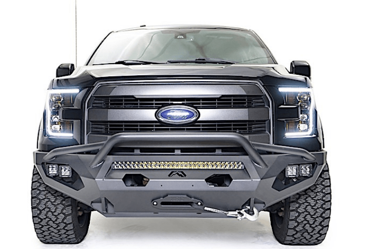 Fab Fours FF15-D3272-1 Aero front bumper with pre-runner guard installed on 2015-2017 Ford F-150, rugged off-road steel bumper with aggressive design and added grille protection