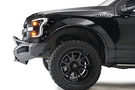 Fab Fours FF15-D3272-1 Aero front bumper with pre-runner guard installed on 2015-2017 Ford F-150, rugged off-road steel bumper with aggressive design and added grille protection