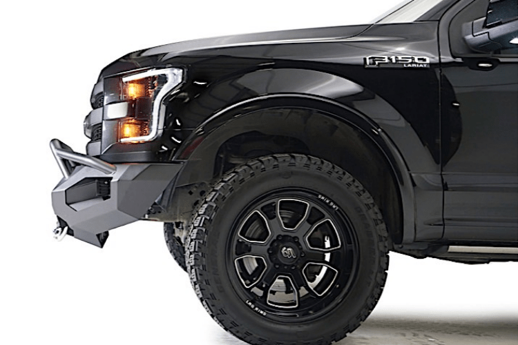 Fab Fours FF15-D3272-1 Aero front bumper with pre-runner guard installed on 2015-2017 Ford F-150, rugged off-road steel bumper with aggressive design and added grille protection