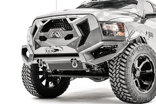Fab Fours GR2900-1 Grumper Front Bumper for 2016–2018 Dodge Ram 2500/3500, featuring aggressive design, winch-ready capability, and integrated sensor holes for rugged off-road performance.