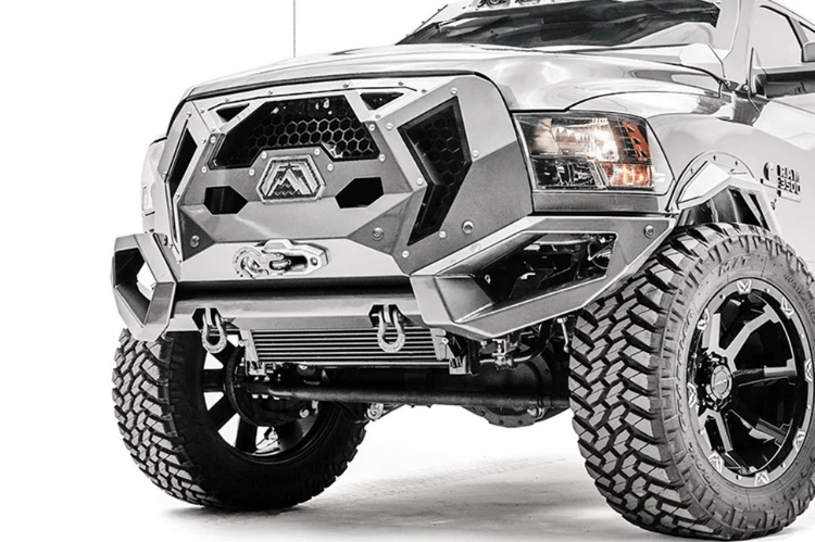 Fab Fours GR2900-1 Grumper Front Bumper for 2016–2018 Dodge Ram 2500/3500, featuring aggressive design, winch-ready capability, and integrated sensor holes for rugged off-road performance.