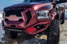 Fab Fours GR2900-1 Grumper Front Bumper for 2016–2018 Dodge Ram 2500/3500, featuring aggressive design, winch-ready capability, and integrated sensor holes for rugged off-road performance.