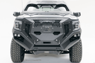 Fab Fours GR3900-1 Grumper front bumper on 2019–2022 GMC Sierra 1500, winch-ready with integrated sensor holes and aggressive grille design