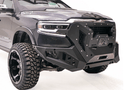 Fab Fours GR4200-1 Grumper front bumper on 2019–2024 Dodge Ram 1500, aggressive full-width design with integrated grille and off-road protection