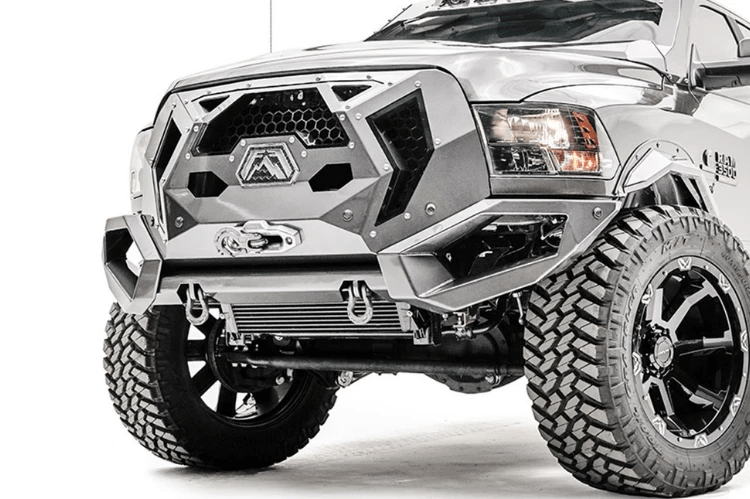 Fab Fours GR4400-1 Grumper front bumper on 2019–2024 Dodge Ram 2500/3500, aggressive off-road design with integrated grille