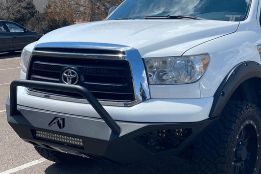 Fab Fours TT07-D4452-1 Vengeance pre-runner style front bumper for 2007–2013 Toyota Tundra, aggressive off-road design with sleek black finish.