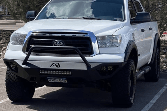 Fab Fours TT07-D4452-1 Vengeance pre-runner style front bumper for 2007–2013 Toyota Tundra, aggressive off-road design with sleek black finish.