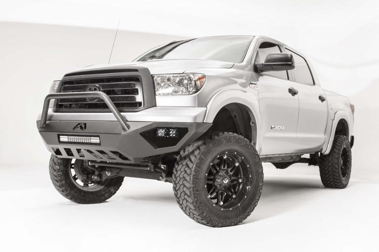 Fab Fours TT07-D4452-1 Vengeance pre-runner style front bumper for 2007–2013 Toyota Tundra, aggressive off-road design with sleek black finish.