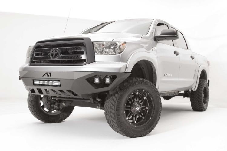 Fab Fours TT07-D4452-1 Vengeance pre-runner style front bumper for 2007–2013 Toyota Tundra, aggressive off-road design with sleek black finish.