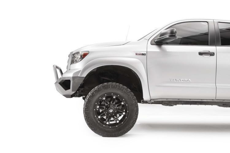 Fab Fours TT07-D4452-1 Vengeance pre-runner style front bumper for 2007–2013 Toyota Tundra, aggressive off-road design with sleek black finish.