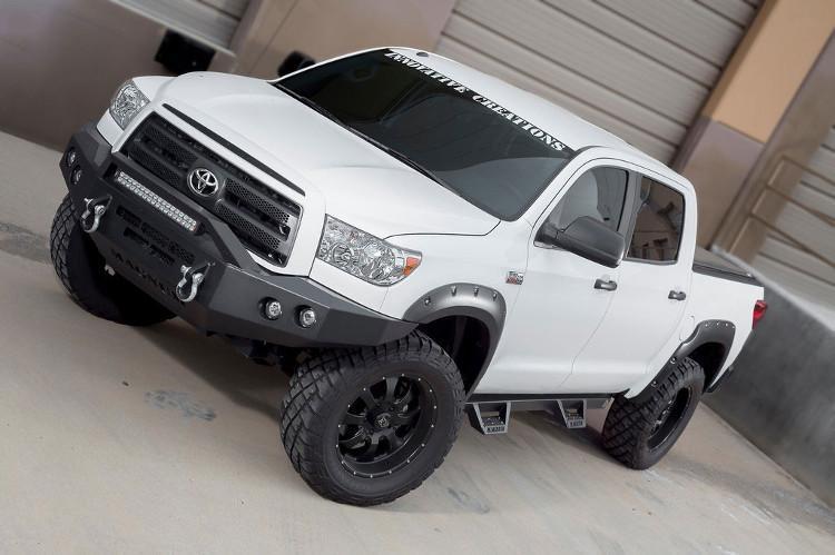 Magnum Raptor Series RTS80TY RT Steps for Toyota Tundra 2007-2018 Crew Max – rugged black side steps with textured non-slip pads for secure footing and a bold off-road look.