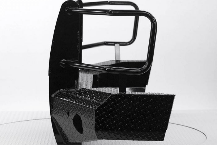 Black diamond plate steel front bumper for GMC Sierra 2500/3500HD trucks, featuring a grille guard design.