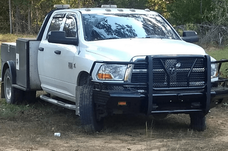Steelcraft HD12260R heavy-duty front bumper with grille guard and hitch receiver for 2010–2018 Dodge Ram 2500 and 3500 trucks, rugged black steel off-road protection.