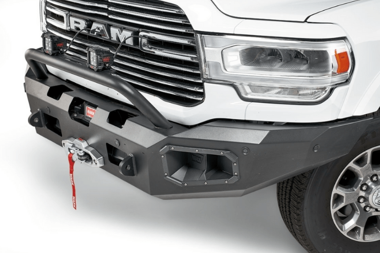 Warn 104256 Ascent Front Bumper for 2019–2024 Dodge Ram 2500/3500, durable winch-ready steel bumper with aggressive off-road styling and factory sensor compatibility.